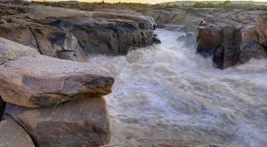 The Orange is South Africa's largest river. At Augrabies in the Northern Cape the river channels through a granite gorge.
